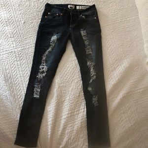 Distressed stretch jeans